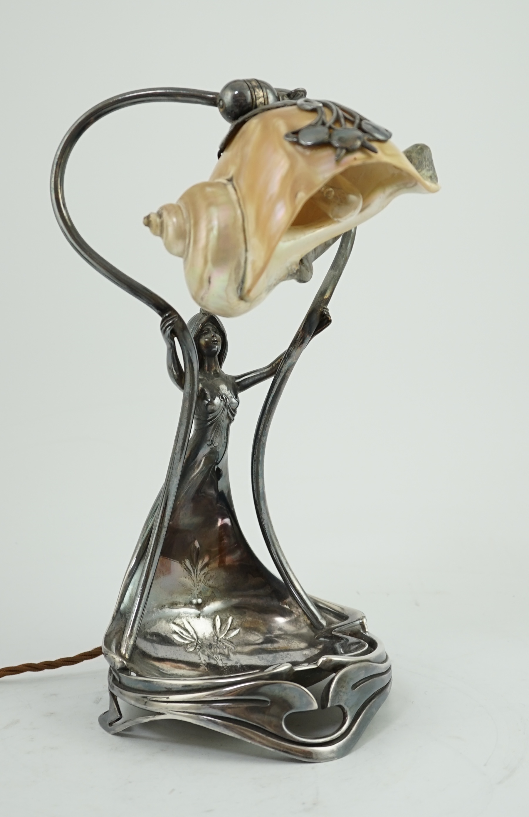 An Art Nouveau electroplate shell mounted adjustable table or wall lamp, by Moritz Hacker, c.1900